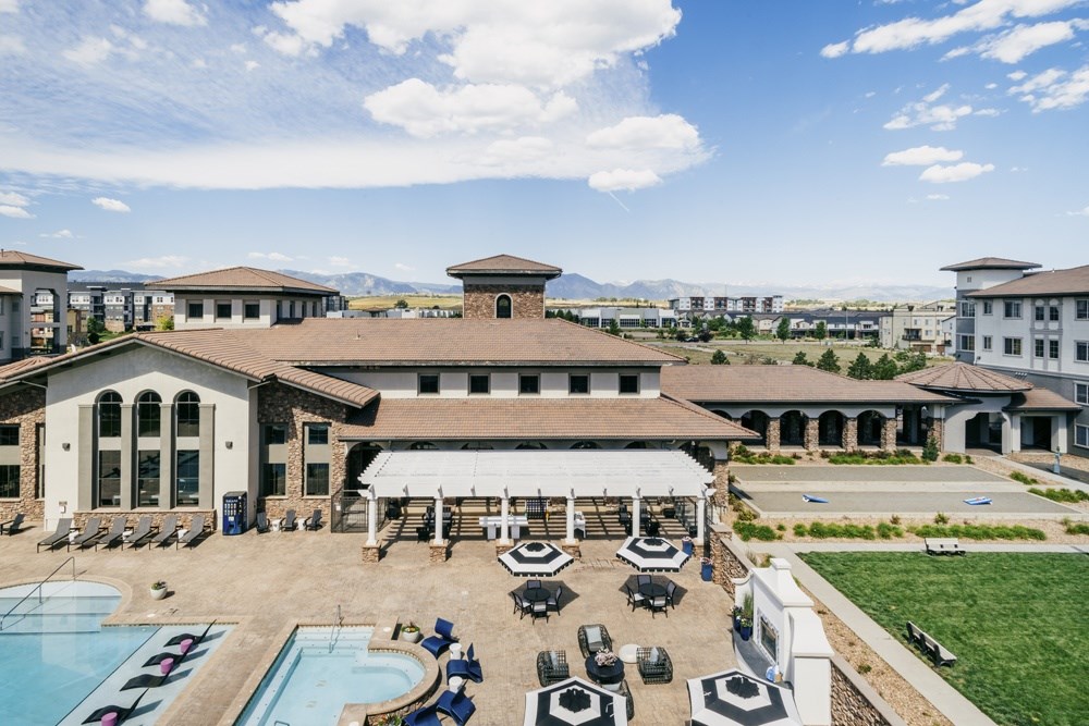 Aerial view of the pool area with lounge seating at Terracina, Broomfield, 80020
