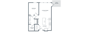 A floor plan of a house with a bedroom, living/dining area, kitchen, pantry, mudroom, and walk-in closet.