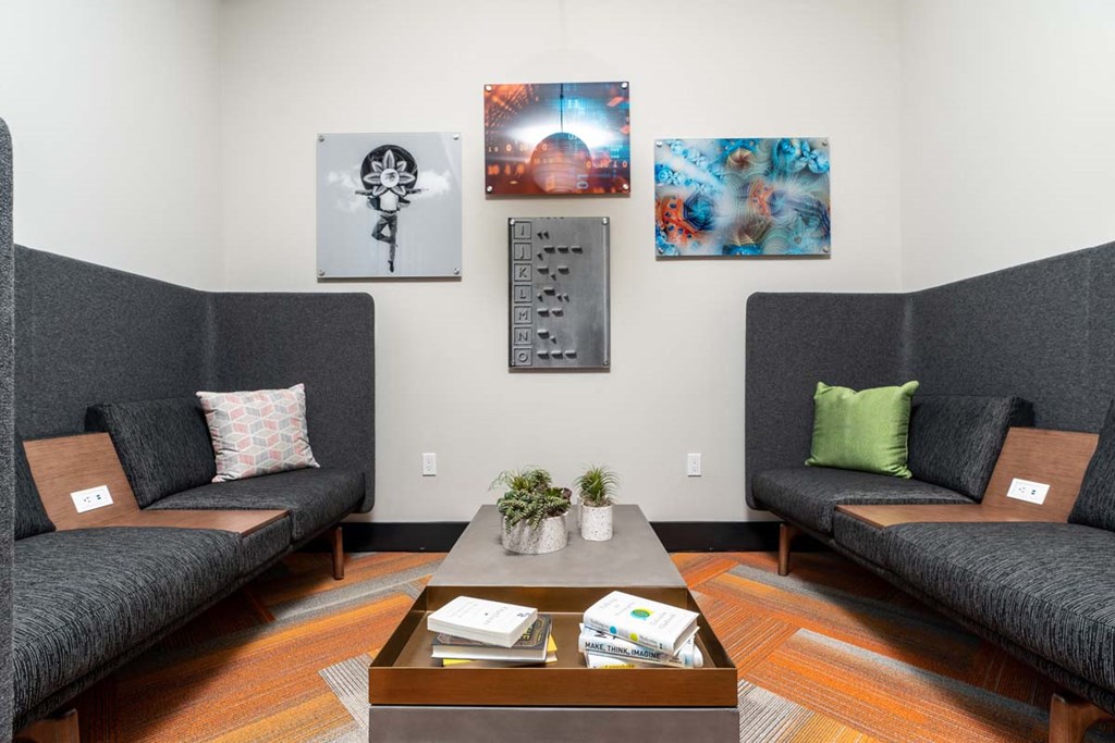 a living room with couches and a coffee table