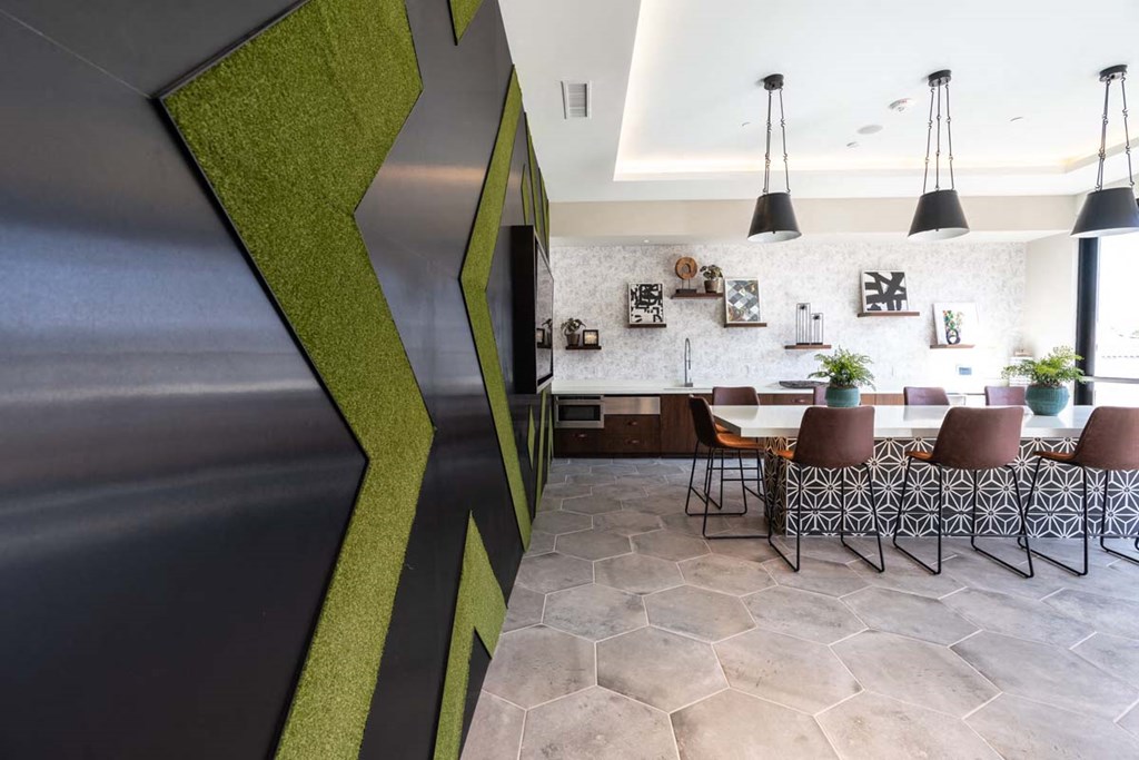 a dining room with a table and chairs in a lobby