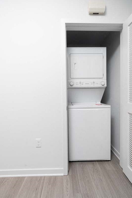 the laundry room has a washer and dryer in it