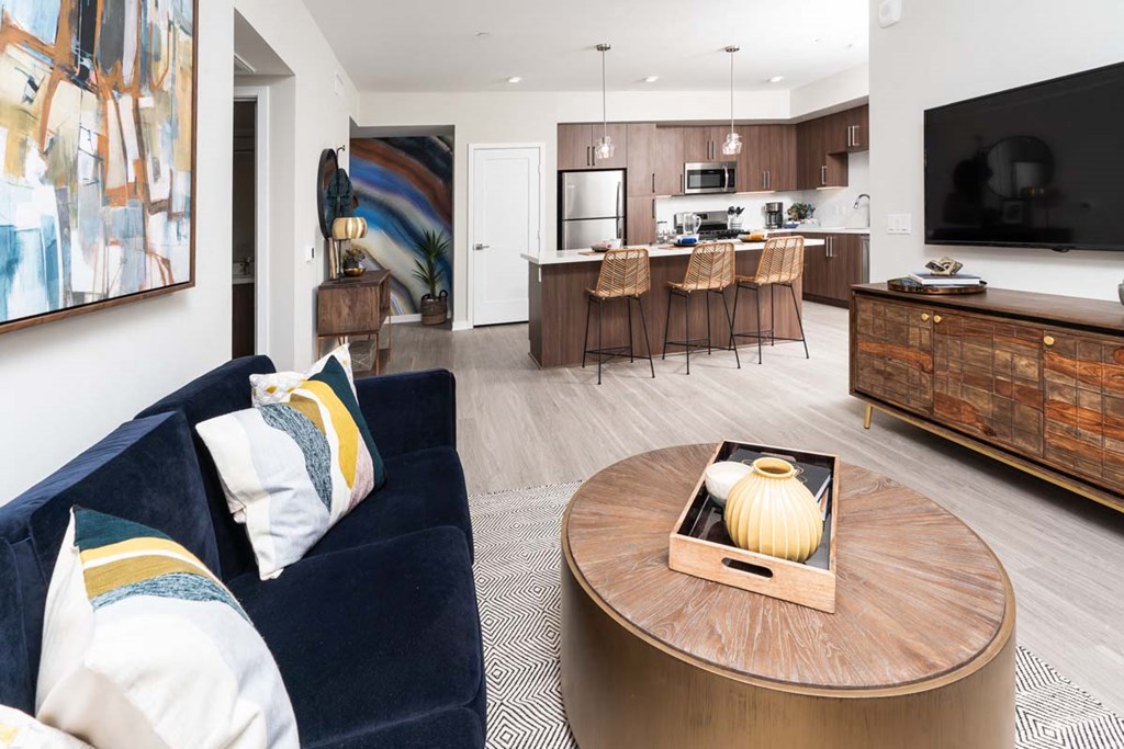 a living room with a couch and a table