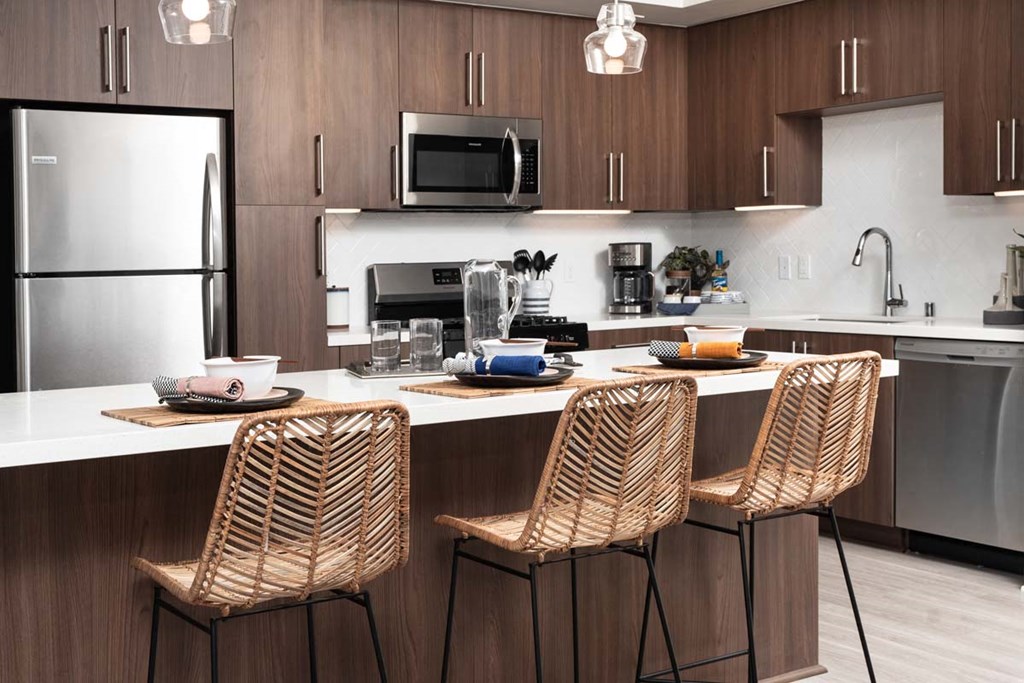 Apartments in Corona, CA for Rent - The Monterey Corona - Kitchen with Modern Cabinetry, a Breakfast Bar, and Plenty of Countertop Space