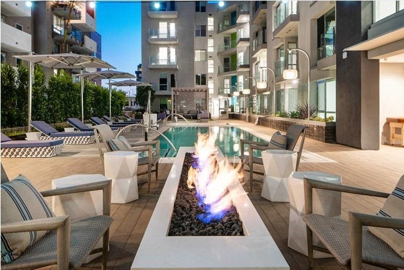a fire pit in the middle of an apartment building
