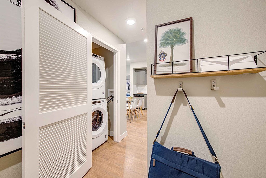 a laundry room with a washer and dryer