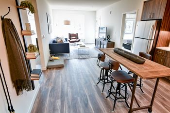 a view of the living room and dining room from the kitchen