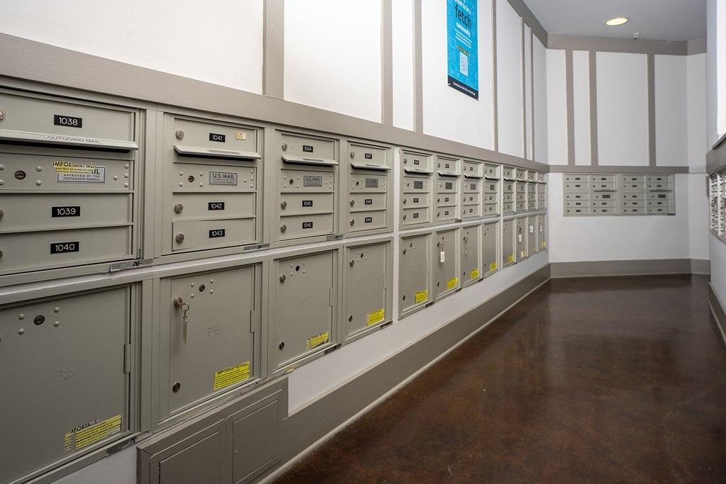a row of metal lockers in a hallway at Trend Design District, Dallas, 75207