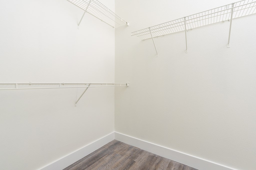 a walk in closet at Trend Design District, Dallas, TX