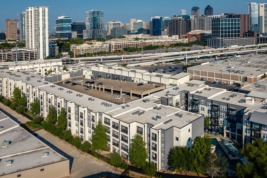 a view of the campus with the downtown skyline in the background at Trend Design District, Dallas, Texas
