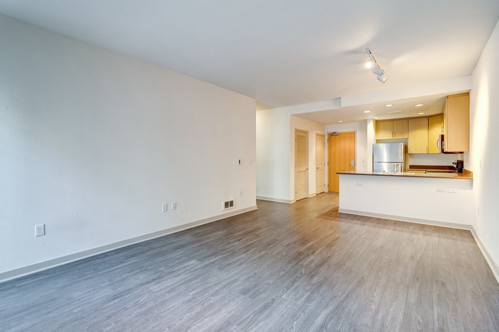 unfurnished living room with wood style plank flooring at Venue, California