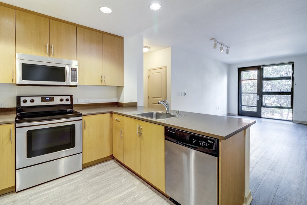 unfurnished kitchen with stainless steel appliances at Venue, San Francisco, CA, 94158
