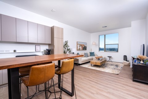 Dining, kitchen and living room with seating