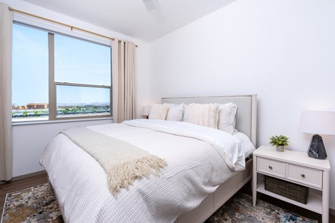 A bedroom with a large bed