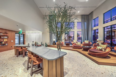 A modern living room with a large island in the center.