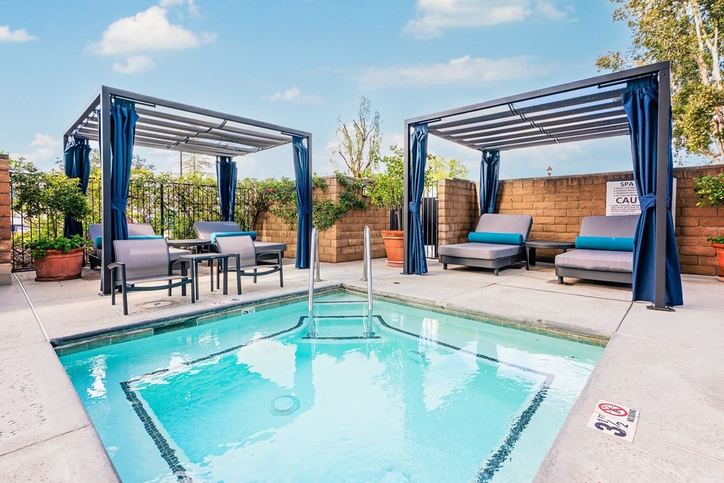 Cabana with jacuzzi and lounge seating
