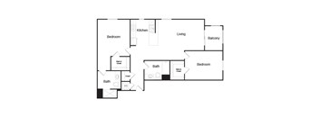 A floor plan of a home with a living room, kitchen, two bathrooms, and three bedrooms.