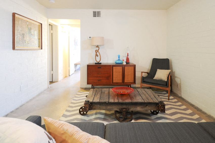 Scottsdale AZ Apartments - Winfield Scottsdale - Spacious Living Room with Concrete-Style Flooring - Photo Gallery