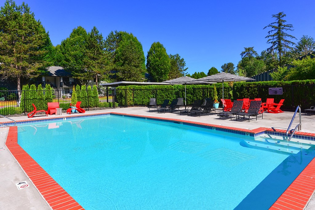 Sparkling Pool Featuring Various Lounge Areas at Woodlake Apartments, Kirkland