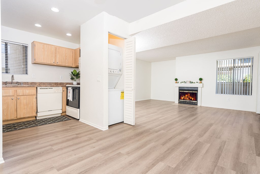 Livingroom and kitchen with in unit washer and dryer