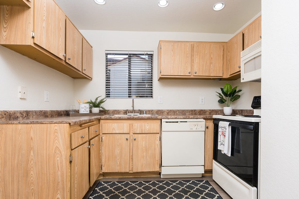 Kitchen with appliances and window