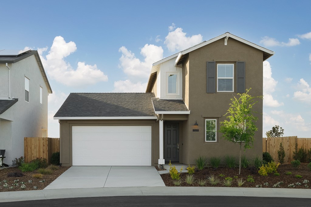 exterior of cyrene at fiddyment two story home  with garage