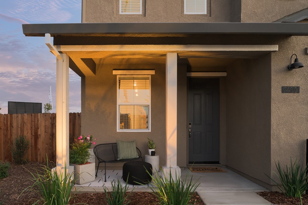 exterior of cyrene at fiddyment fron tporch with outdoor seating