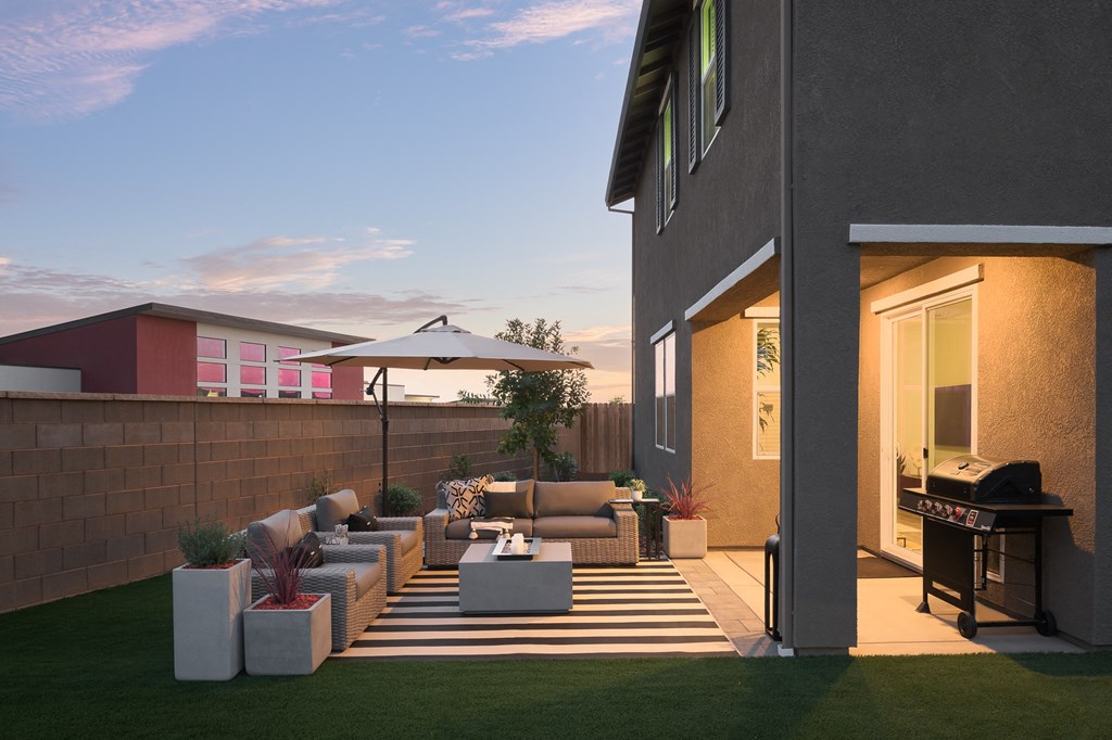 cyrene at fiddyment backyard with outdoor furniture and bbq grill