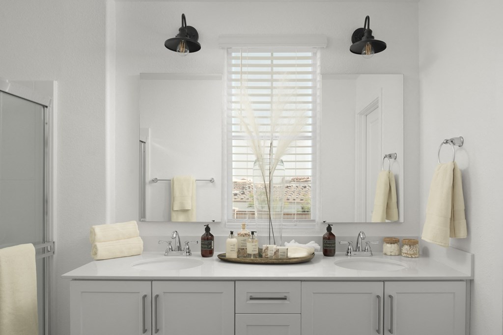 cyrene at fiddyment bathroom with dual sink and mirror