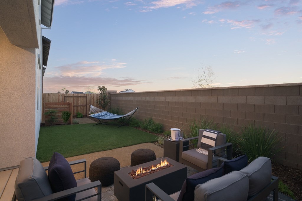 cyrene at fiddyment backyard with outdoor furniture and firepit