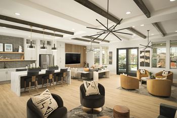 A modern living room with a fireplace and a dining area.