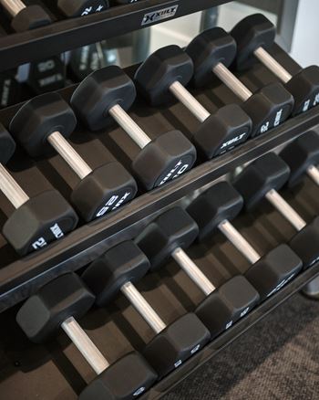 A set of dumbbells with the brand name 'KERFUEL' on them.