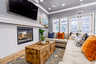 a living room filled with furniture and a flat screen tv at Barrington Place, Rancho Cucamonga, CA, 91739