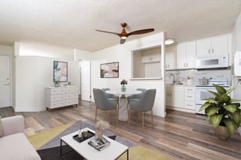 furnished living room with hardwood flooring