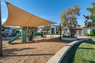 a shade sail over a playground at Barrington Place, California, 91739