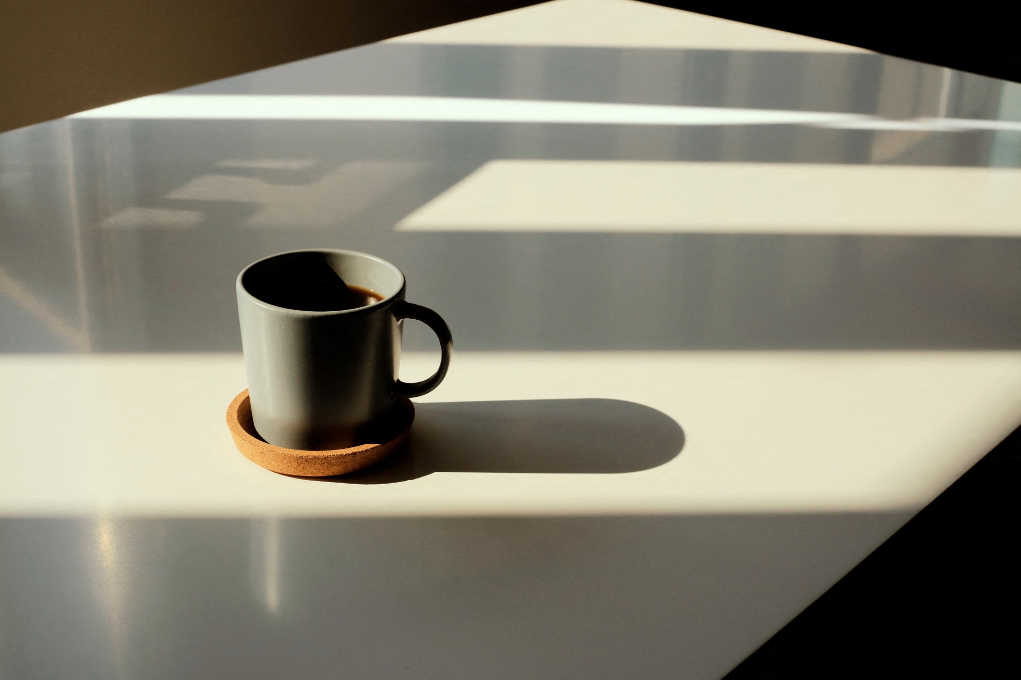 coffee mug on white counter