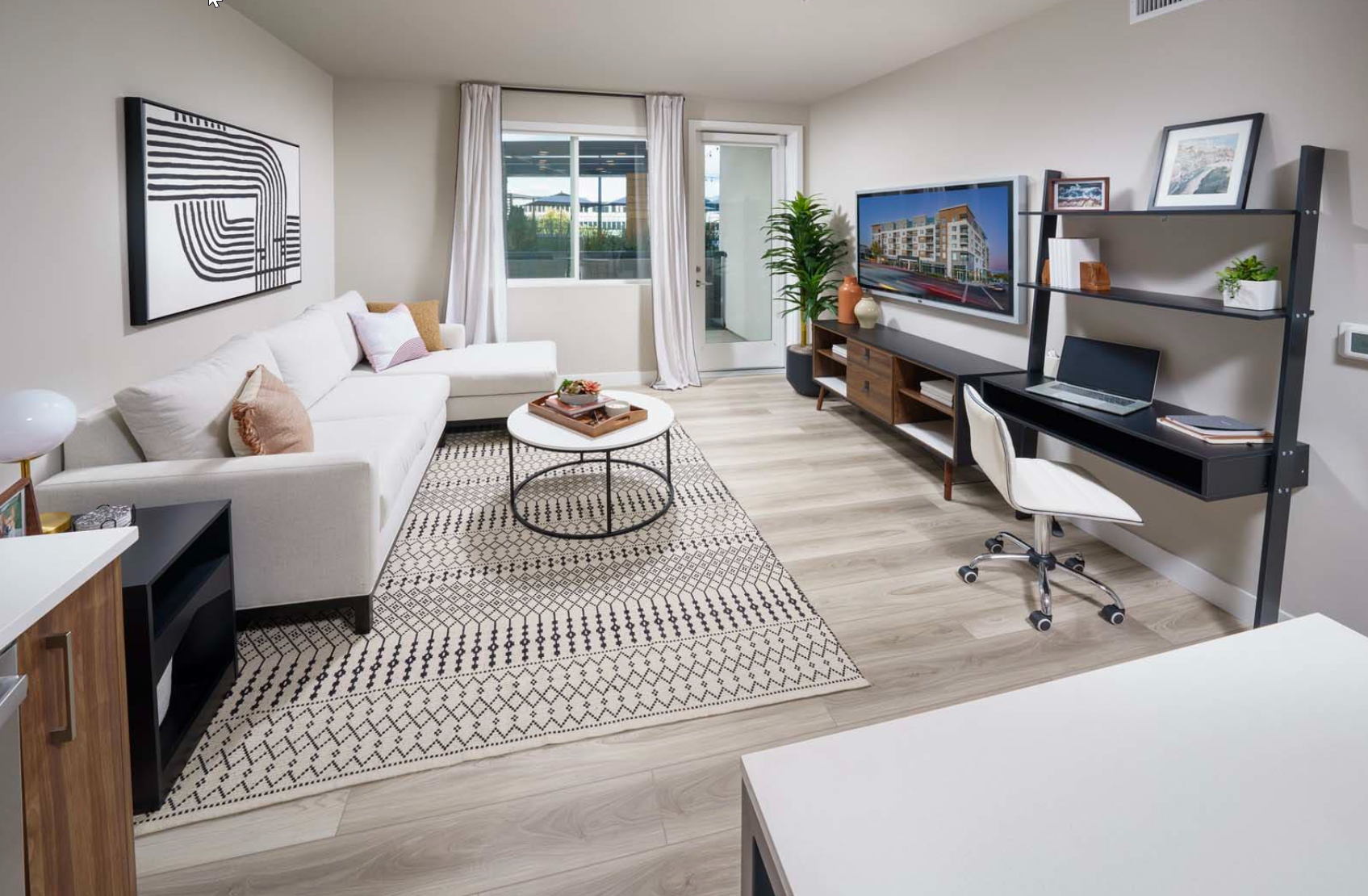 Walnut Creek Apartments - NoMA - Furnished Living Room with Plank Luxury Flooring, Door to Patio and a Window