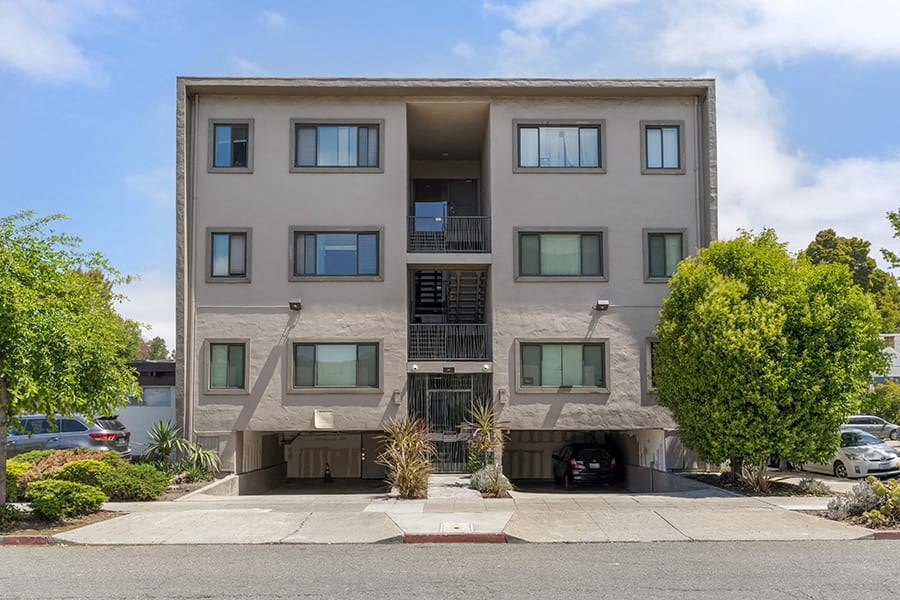 a building with a parking lot in front of it