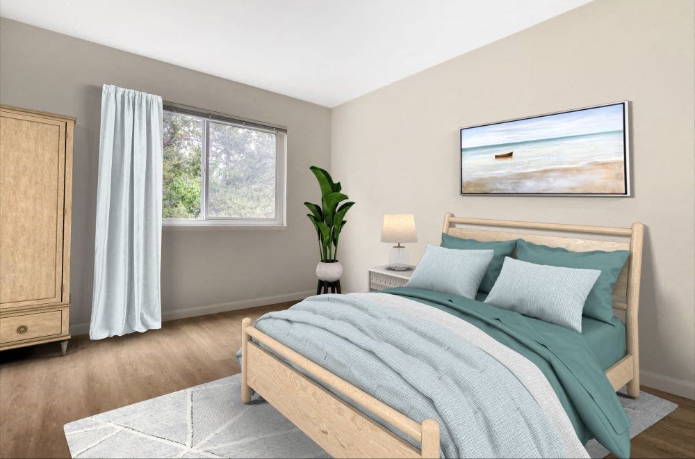 a bedroom with a bed and two windows