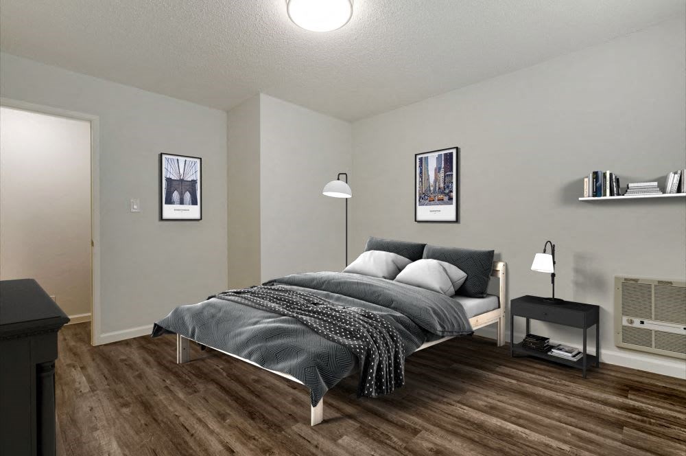 a bedroom with a bed and a nightstand