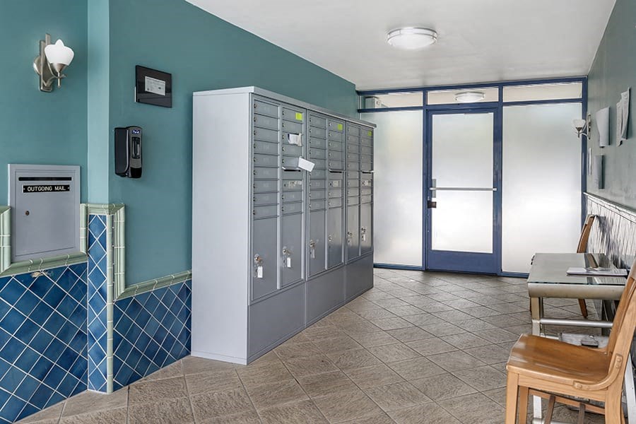 a locker room with a table and chairs