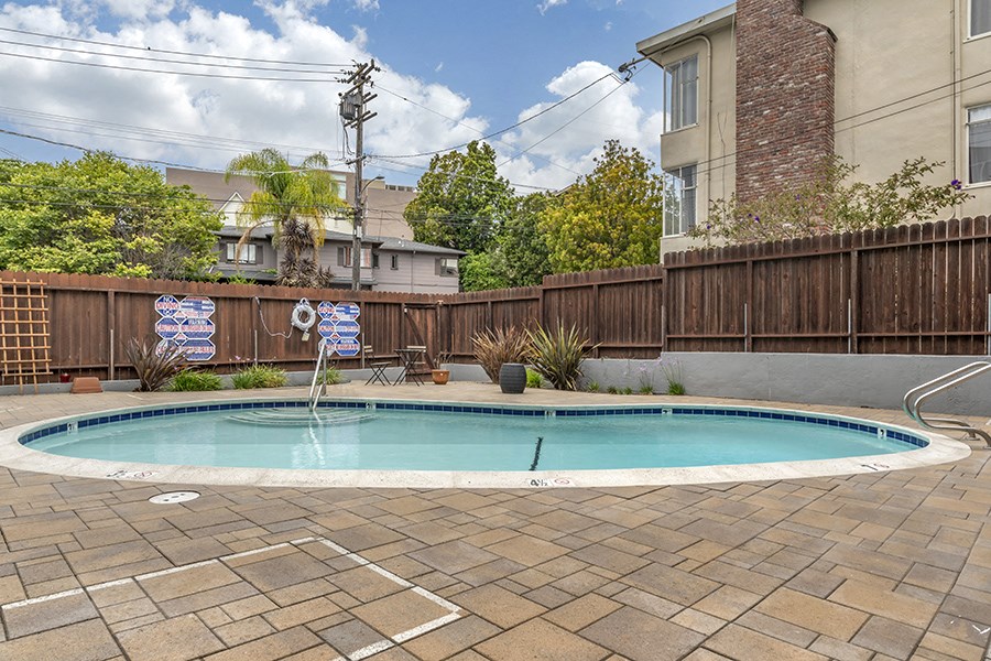 take a dip in the resort style pool at the enclave at woodbridge apartments in sugar land