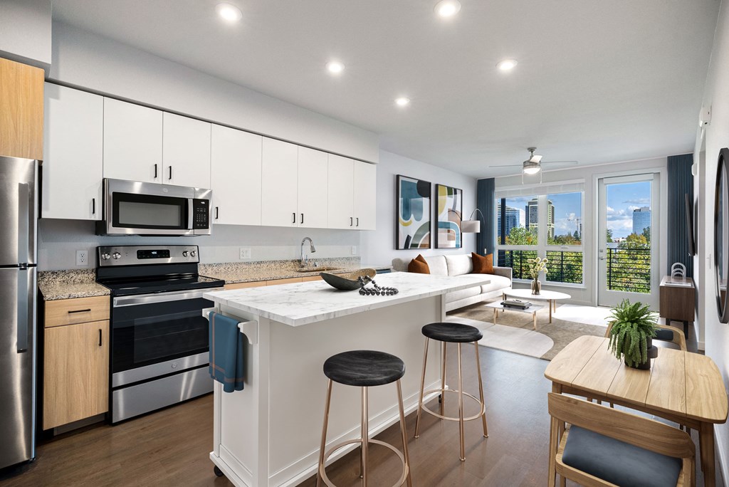 Virtually Staged Kitchen with white cabinets and stainless steel appliances