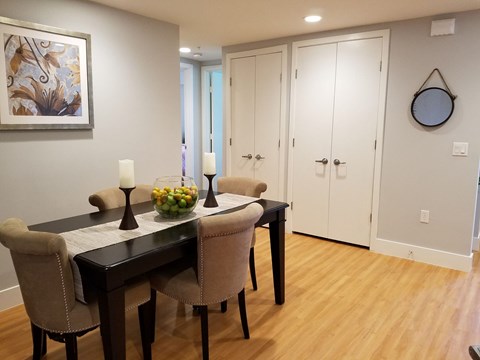 A dining room with a table set for two at Woodley Sara Apartment, California