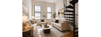 A living room with a spiral staircase and a large window.