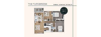 A floor plan of a two bedroom apartment with one and a half baths and 977 square feet.