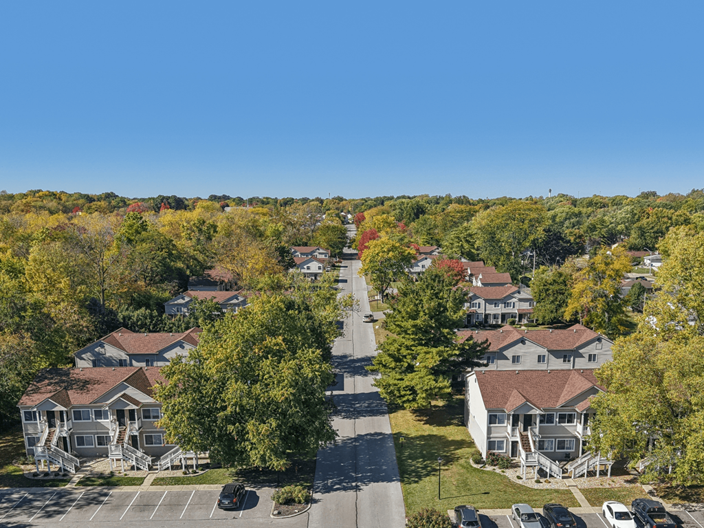 A residential area with houses and trees.