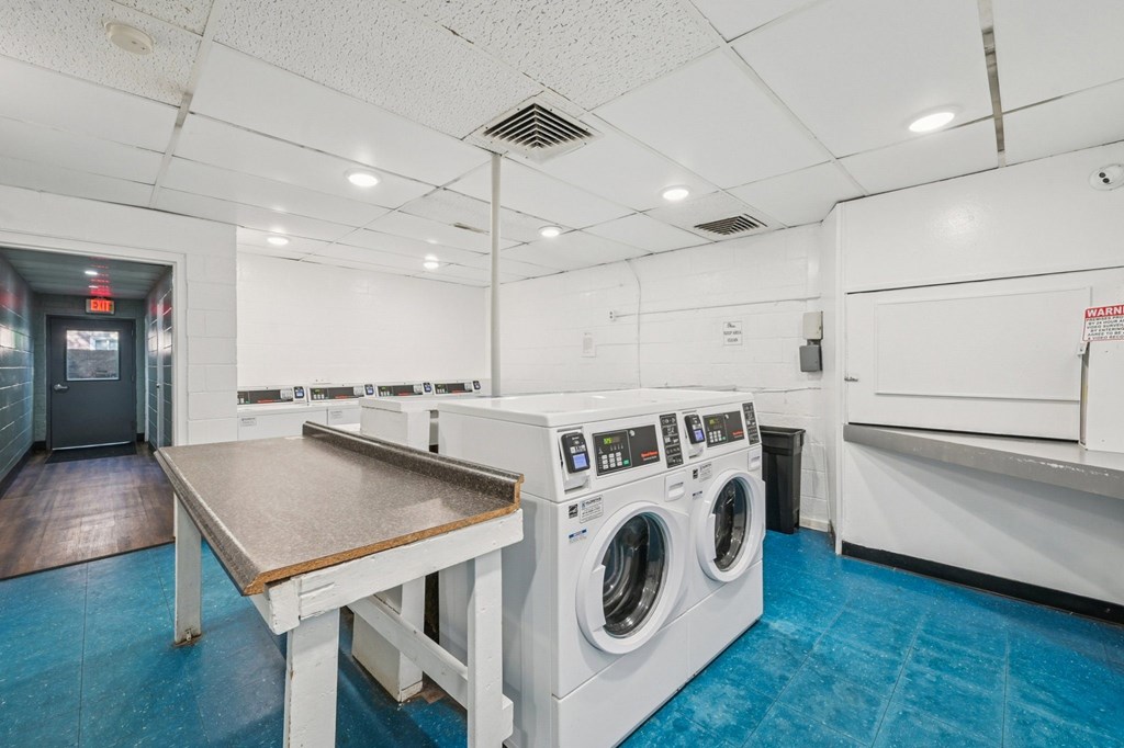 A laundry room with a washer and dryer.