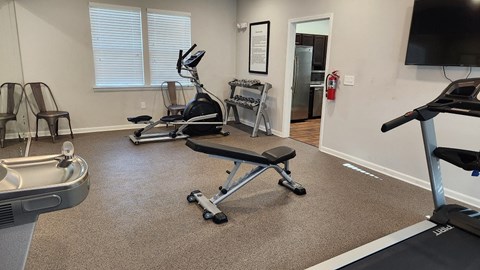 our gym is equipped with cardio equipment and a tv