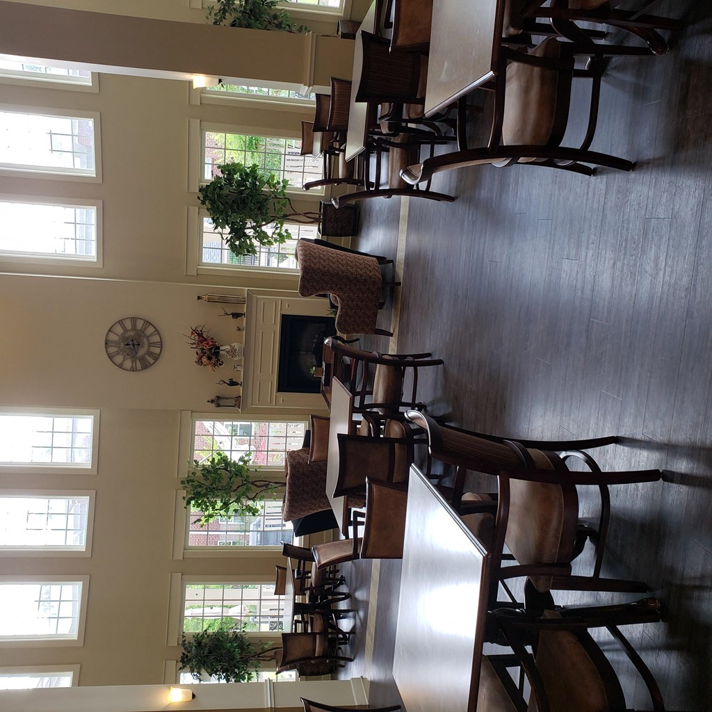 a group of chairs hanging from a wall in a room