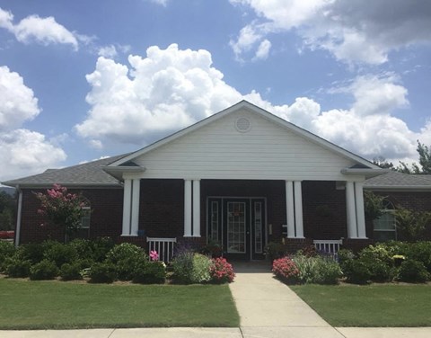 a house with a sidewalk in front of it